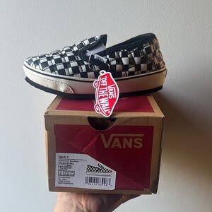 Vans Black and White Checkered Slip-Ons